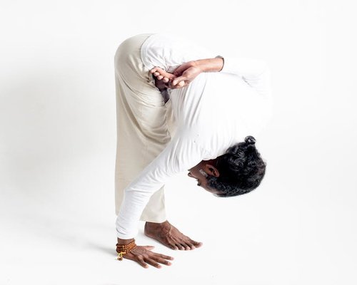 Advanced yoga poses demonstrating strength and flexibility requirements